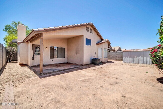 Building Photo - 8544 W Cherry Hills Dr