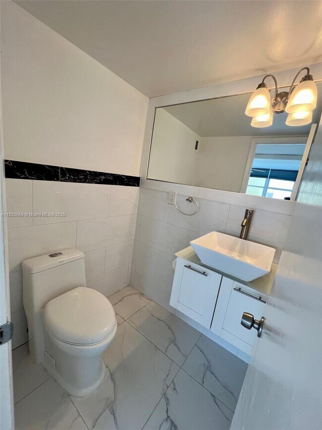 Building Photo - 5838 Collins Ave