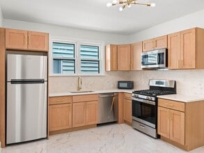 Building Photo - Beautifully Renovated 4-Bedroom Home with Designer Kitchen, Updated Bath & Central Air – Availabl...