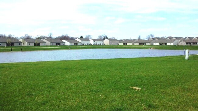 Building Photo - Wake up to a stunning pond view in this beautiful 2 BD 2BA duplex with a 2 car attached garage