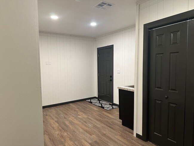 Building Photo - Welcome to country living with a fresh, modern twist.