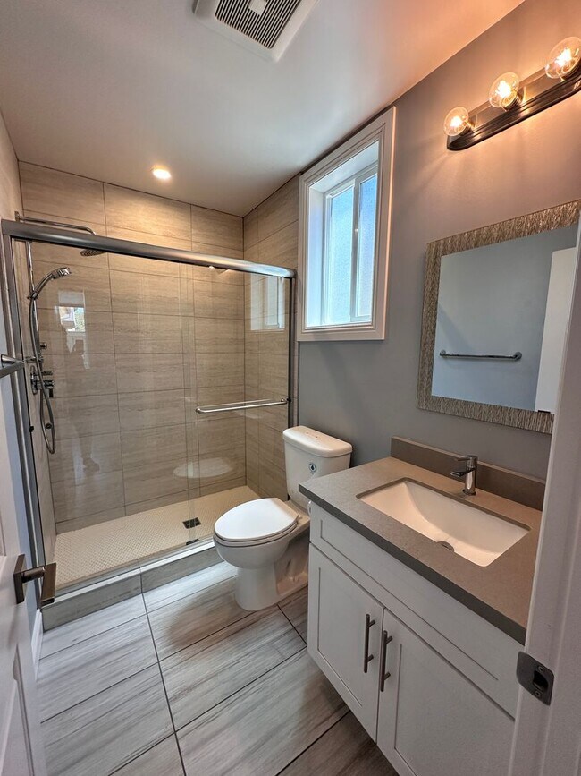 Building Photo - Attached separate first floor 1-bedroom, 1-bathroom suite