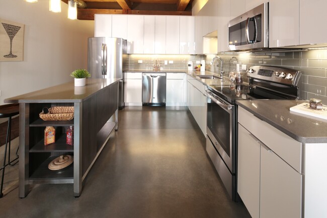 Ample storage in these modern cabinets - Modera Lofts