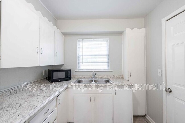 Building Photo - 230 E 51st Pl N