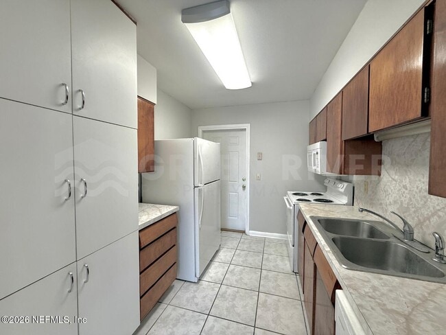 Building Photo - 7963 Lemans Dr