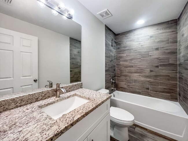 Building Photo - Move-In Special! Half Month FREE – APPLY by November 30th – Modern 3BR/2BA Duplex in Lehigh Acres...