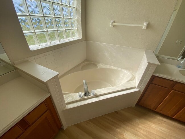 Building Photo - ANNUAL Lease – Unfurnished – Golf Course Lot - Designer Home in the highly sought-after gated com...