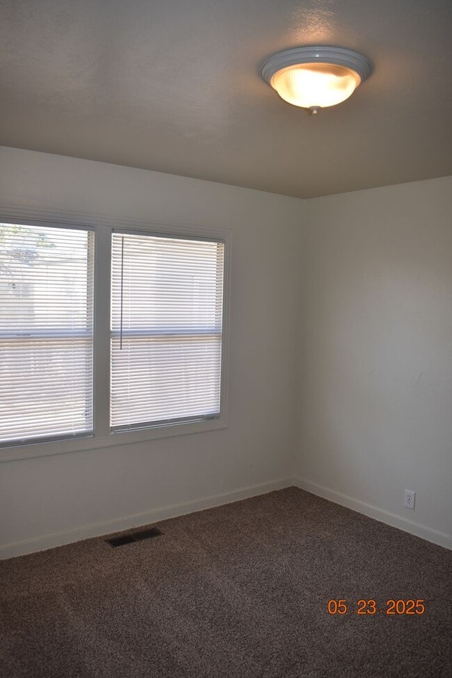 Building Photo - Charming Three Bedroom Home with New Carpe...
