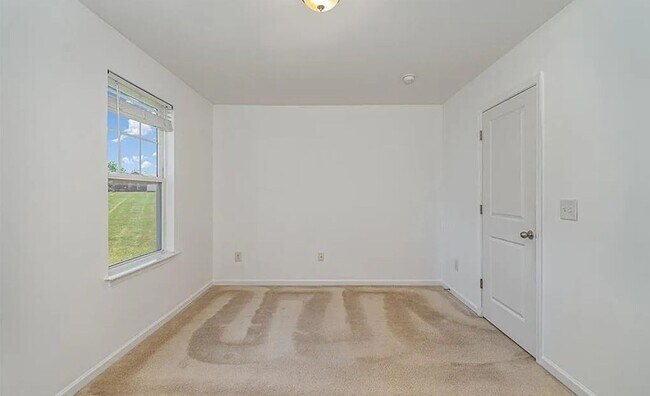 Building Photo - Charming 3BR Townhome in Colfax