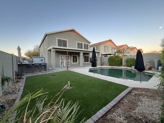 Building Photo - "Charming 4-Bed Oasis with Granite Touch & a Beautiful Pool"