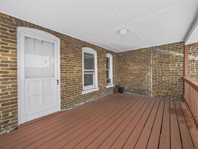 Building Photo - Charming 3-Bedroom Single-Family Home with Wrap-Around Porch & Private Fenced Yard
