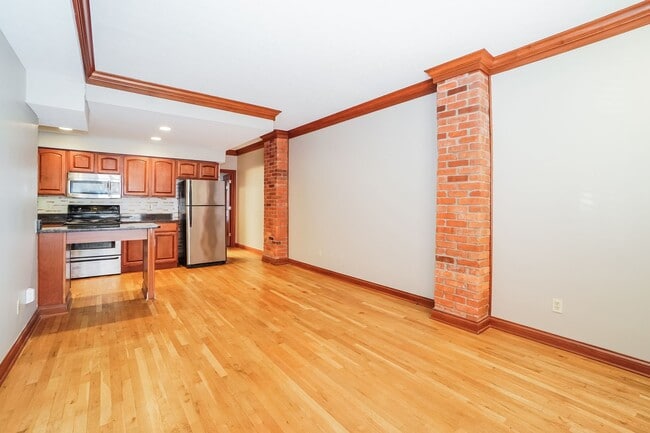 Building Photo - Charming 1-Bedroom Apartment with Exposed Brick, Hardwood Floors & Updated Kitchen