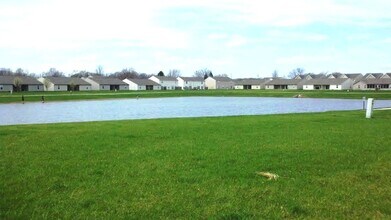 Building Photo - Beautiful pond view in this open floor pla...