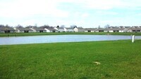 Building Photo - Beautiful pond view in this open floor pla...