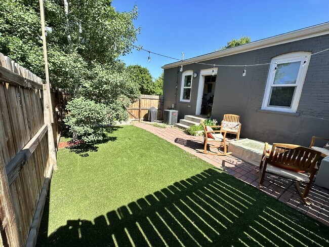 Building Photo - "Charming 2-Bed, 2-Bath Home with Gleaming Hardwood Floors in Vibrant Denver!"