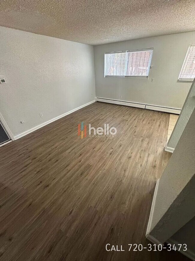 Building Photo - 9504 East 17th-102