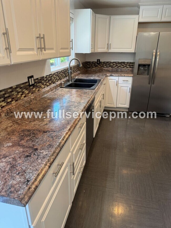 Building Photo - Spacious 4-Bedroom Upper-Level Home with Fireplace, Bonus Room & Large Deck