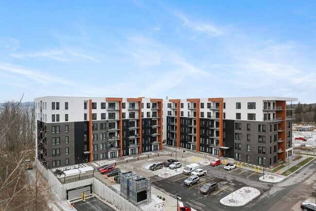 Building Photo - Courtyard Calm Meets City Convenience – 1B...