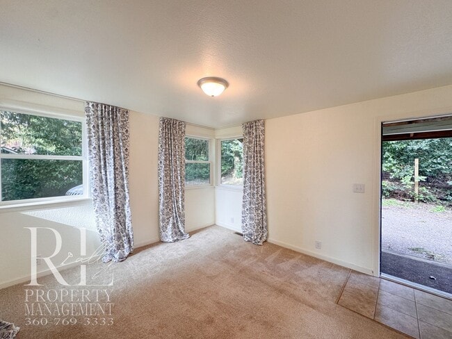 Building Photo - Private Retreat with Expansive Yard & Loft Space