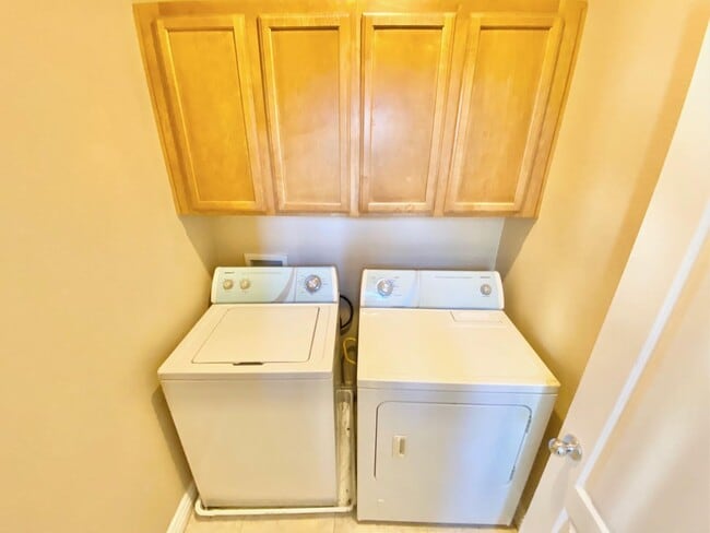 Building Photo - THIS SPACIOUS RESIDENCE FEATURES 4 BEDROOM...