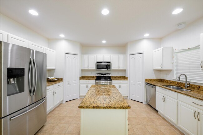 Building Photo - 6147 NW Butterfly Orchid Pl