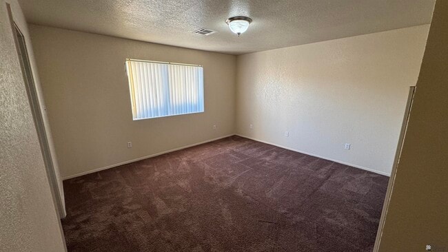 Building Photo - 8573 E 25th St