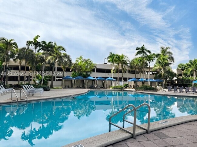 Building Photo - 19370 Collins Ave