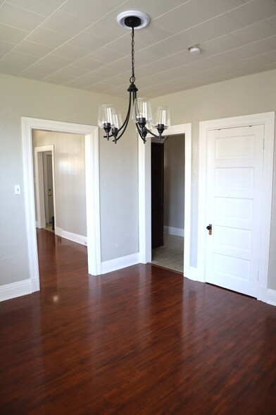 The white door provides access to a large closet for storage - 715 Clinton Pl