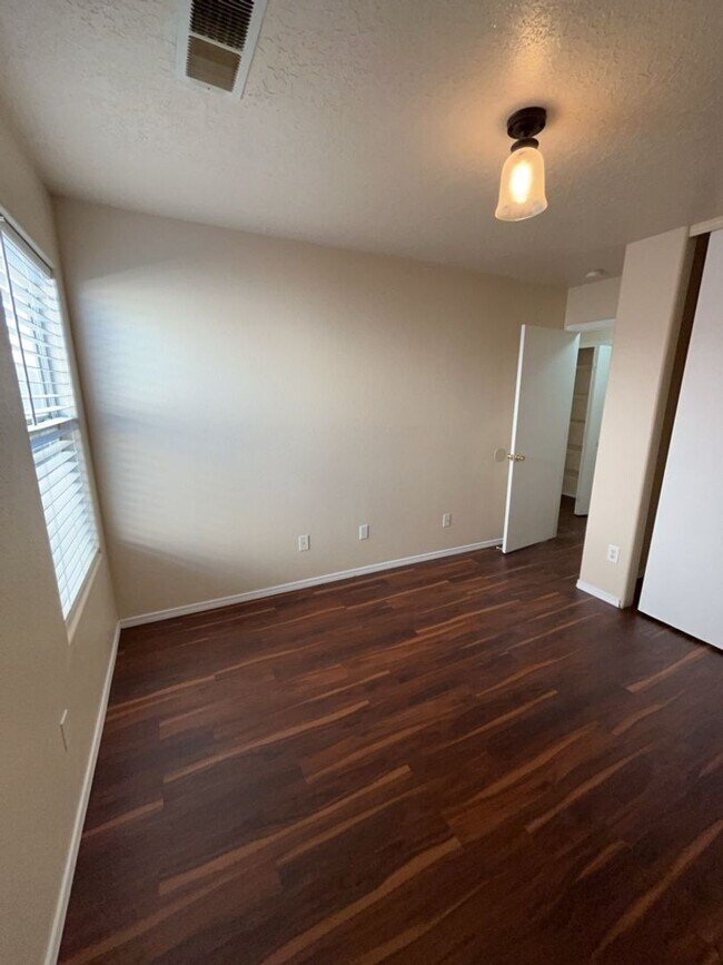 Building Photo - Three Bedroom, two Bath single-story home.