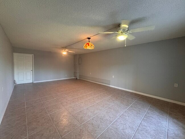 Building Photo - Coastal Luxury Awaits – 3-Story Townhome i...