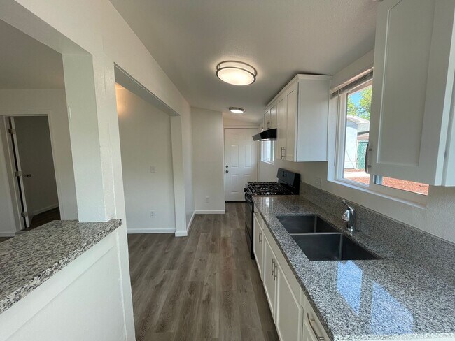Building Photo - Burney Street Triplex