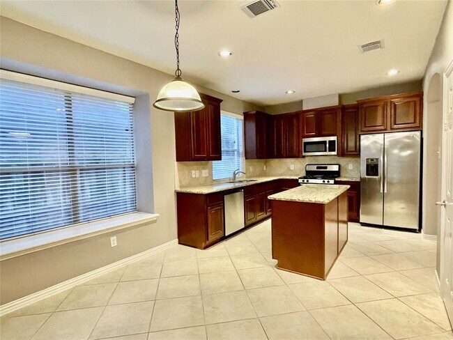 Building Photo - 5527 Custard Apple Trail