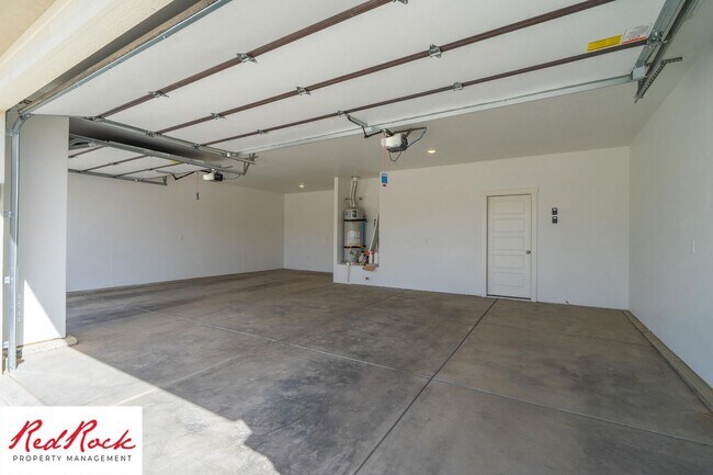 Building Photo - Comfort, Space & Style with a 3-Car Garage Small Dog Friendly!