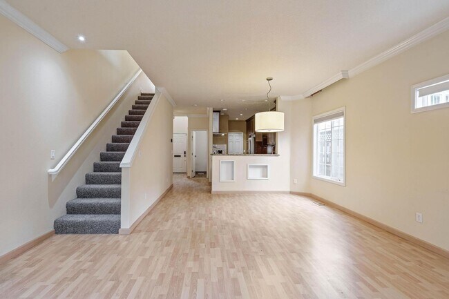 Building Photo - $500 move-in special! Unique 2-bdrm/2.5-bath duplex w/ A/C—Private patio, storage, garage w/ wash...