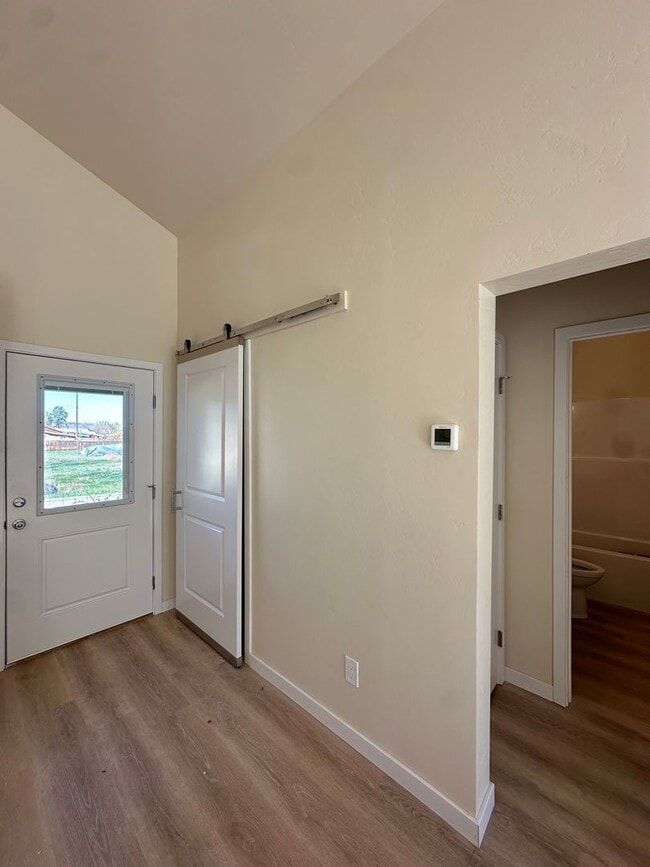 Building Photo - Bright & New 2 Bed / 2 Bath with Vaulted Ceilings & Covered Parking!