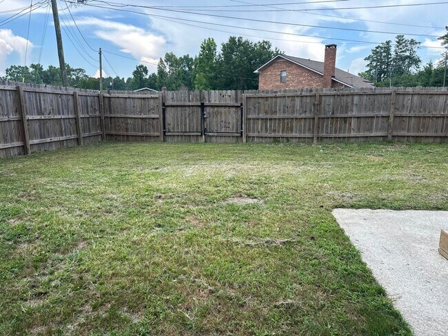 Building Photo - Move-In Ready Corner-Lot Home with Wraparound Porch Near Fort Eisenhower