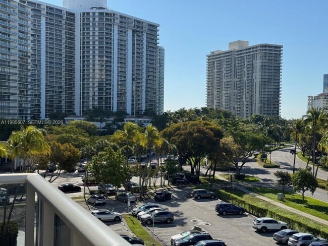 Building Photo - 3675 N Country Club Dr