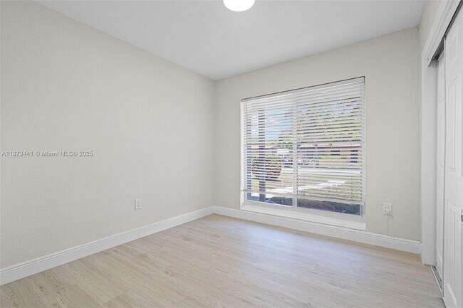 Building Photo - 3220 NW 4th Ct