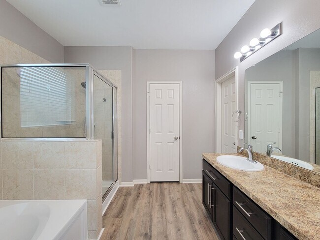 Building Photo - Welcome to this charming one-story home fe...