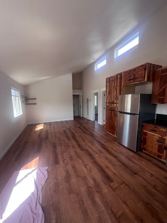 Building Photo - 2 Bedroom 1 bath house with extra large double car garage and extra storage space!