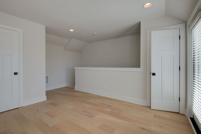 Building Photo - COMING SOON! Modern End-Unit Living Near Uptown | Rooftop Terrace + Tandem Garage