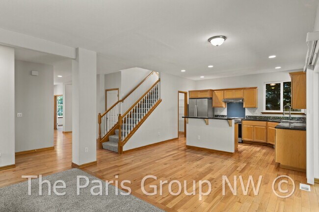 Building Photo - Beautiful Central Bothell Home. Great Floor Plan! Open Lvg Spaces, Office, Bonus Room  + XL Bedro...