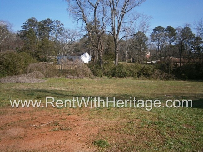 Building Photo - GORGEOUS RANCH/ GRAND PA'S BUNGELOW/ 1.6 ACRES/ FRONT PORCH/ PRIVATE YARD