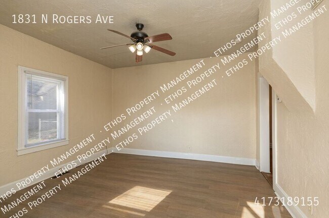Building Photo - 1831 N Rogers Ave