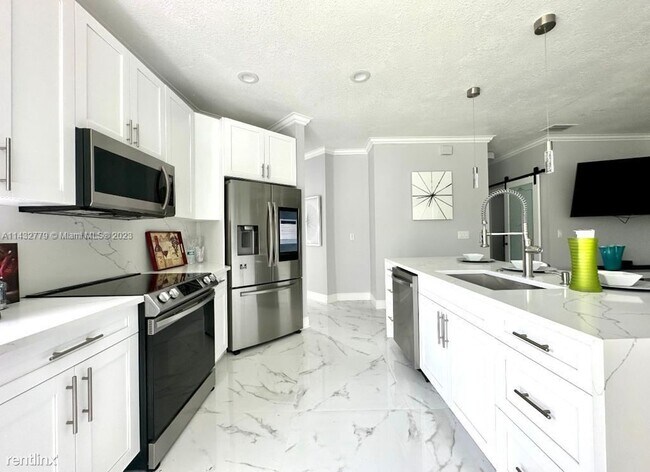 Building Photo - 3 br, 2.5 bath House - 8910 NW 45th Ct # 0