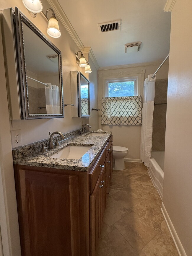 Building Photo - $300 off one month!!!  Modern Comforts with Granite & Hardwood Finishes!" 3 Bedroom 2 bath home.