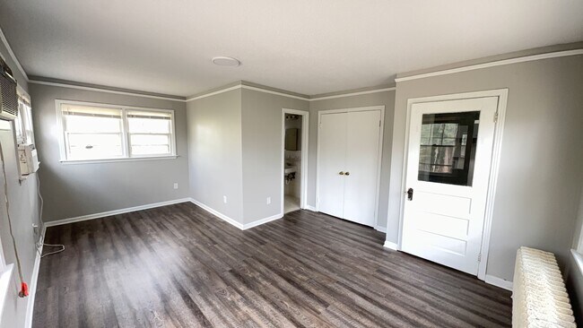 Building Photo - Spacious 4 Bedroom Midtown Home with Basement & Attic Storage