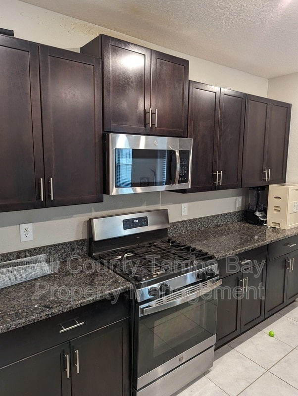 Building Photo - 5209 Dandelion St