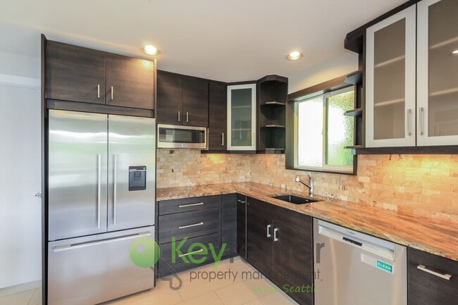 Building Photo - Waterfront Elegance with Private Dock and Designer Finishes