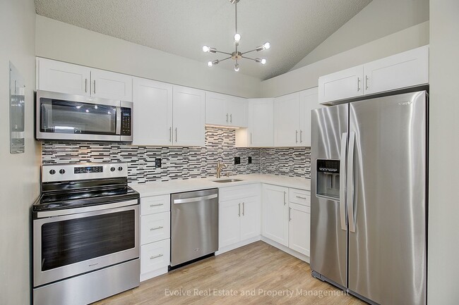 Building Photo - Evolve Real Estate: Top-Floor Condo in Prime Denver Location-Near DTC Available May 1st